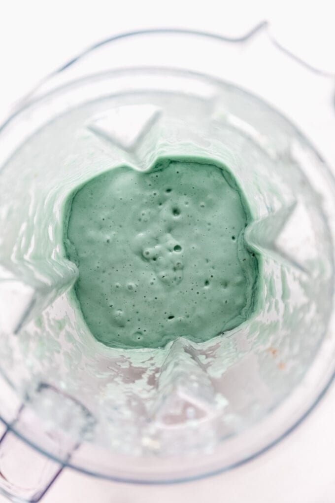 a blue spirulina smoothie in a blender